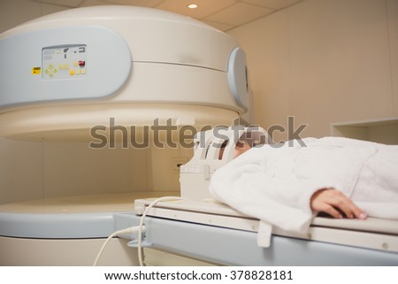 Patient being scanned and diagnosed on a computed tomography