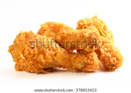 hot and crispy fried chicken legs isolated on a white background Royalty-Free Stock Photo #378853423