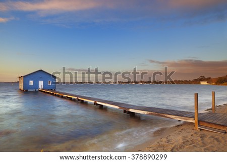 Sunrise over the Matilda Bay boathouse in the Swan River in Perth, Western Australia.
