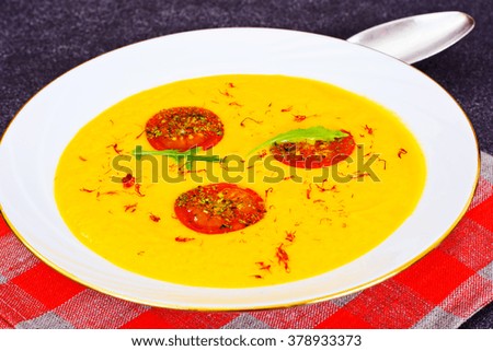 Pumpkin Soup with Carrot and Cherry Tomatoes, Saffron, Dried Herbs Studio Photo