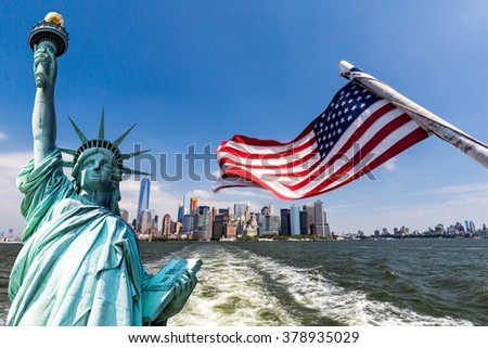 View to Downtown Manhattan and the USA flag from Liberty Island, August 2015