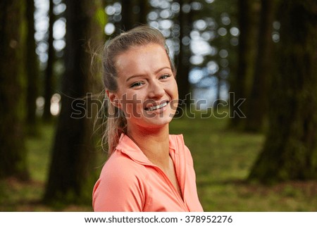 girl running smiling at camera