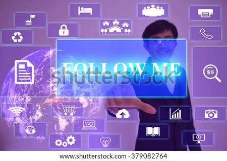 FOLLOW ME concept  presented by  businessman touching on  virtual  screen ,image element furnished by NASA