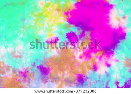 tie dyed pattern on cotton fabric background.
