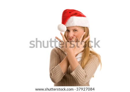 Portrait of pretty christmas teenage girl indicating victory sign isolated on white background