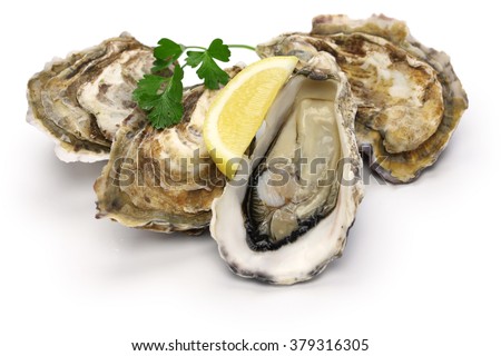 fresh oysters isolated on white background Royalty-Free Stock Photo #379316305