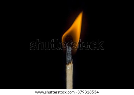 Flaming Match Royalty-Free Stock Photo #379318534