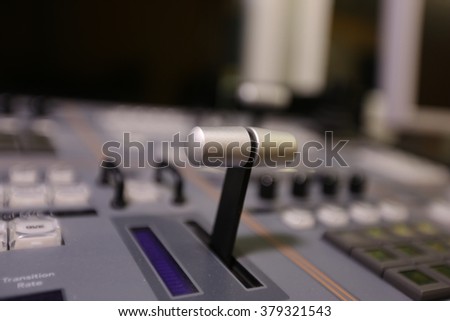 TV editor working with video and audio  mixer