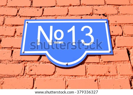 Blue plate with room No. 13