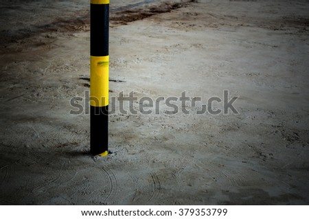 Pole warning yellow and black
