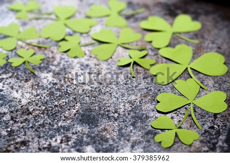 Happy St Patrick's Day. Diy paper clover decoration. Blank space for text. Background. Invitation card