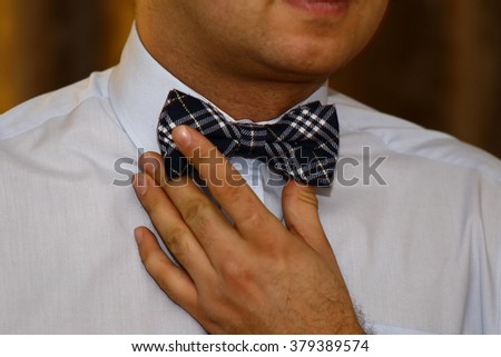 Standing man with Bow tie luxury background