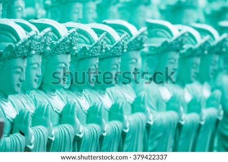 Statue of Guanyin made of rock green.
