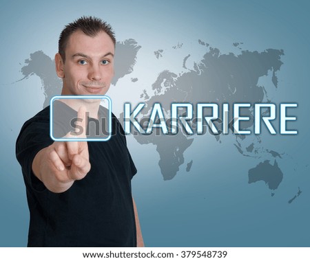 Karriere - german word for career - young man press button on interface in front of him