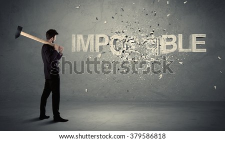 Business man hitting impossible sign with hammer on grungy wall