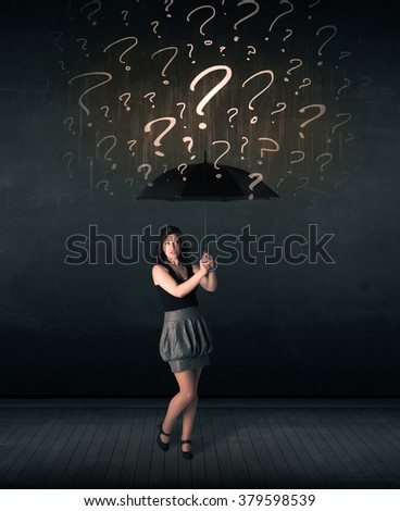 Businesswoman with umbrella and a lot of drawn question marks concept on background