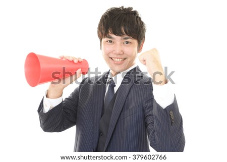 Man who is cheering with megaphone