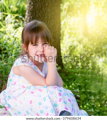 Happy little girl outdoor