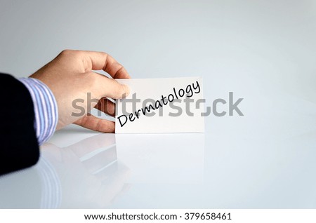 Business man hand writing dermatology