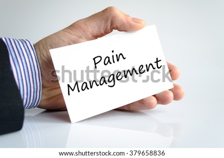 Business man hand writing pain management