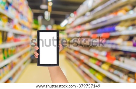Abstract blurred image of s grocery store for background usage .