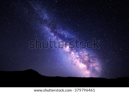 Landscape with Milky Way. Night sky with stars at mountains.