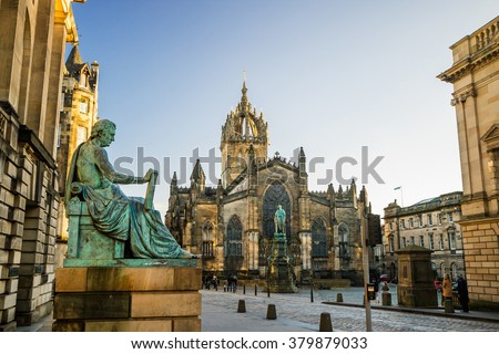 Street view of the historic Royal Mile, Edinburgh, Scotland Royalty-Free Stock Photo #379879033