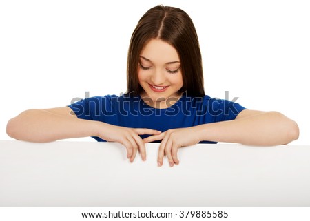 Happy woman with blank board.