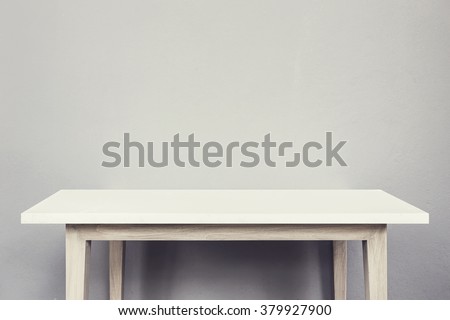 Empty top of natural stone table and grey wall background. For product display  Royalty-Free Stock Photo #379927900