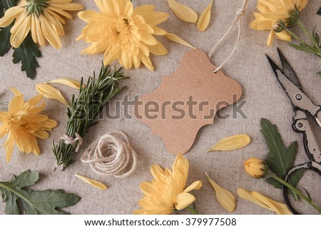 Identity and craft mock up with yellow flowers,selective focus