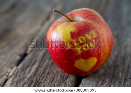 apple with heart and text 'i love you'