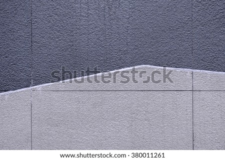 Concrete wall texture two tones design, gray and cream colors. 
