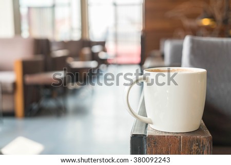coffee cup in cafe - soft focus with vintage effect picture style