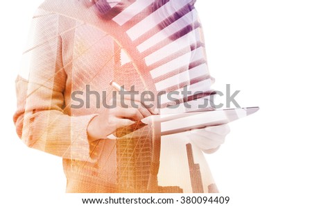 double exposure business woman using tablet similar to ipad in city isolated with clipping path inside image data 