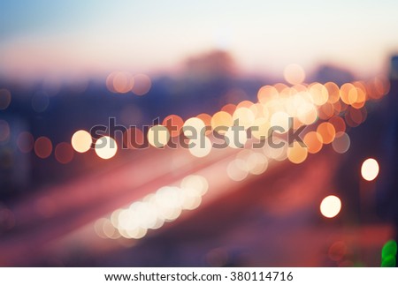 Blurred defocused colorful lights of traffic in the city Royalty-Free Stock Photo #380114716