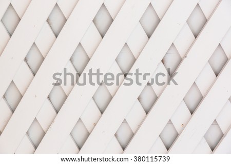 Wooden fence lattice pattern background.