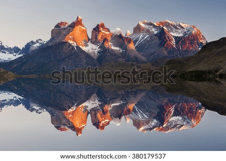 Majestic mountain landscape. Reflection of mountains in the lake. National Park Torres del Paine, Chile. Royalty-Free Stock Photo #380179537