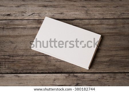 Business card blank on wood background