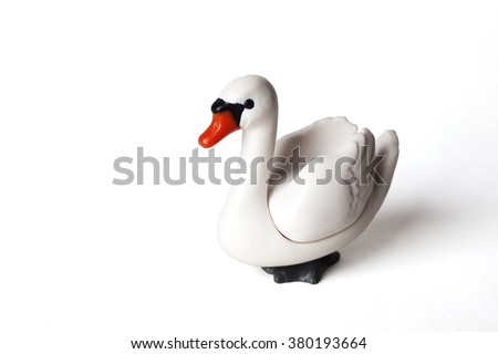 Swan plastic toy isolated on white background