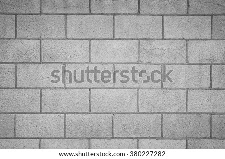 Concrete block wall seamless background and texture Royalty-Free Stock Photo #380227282