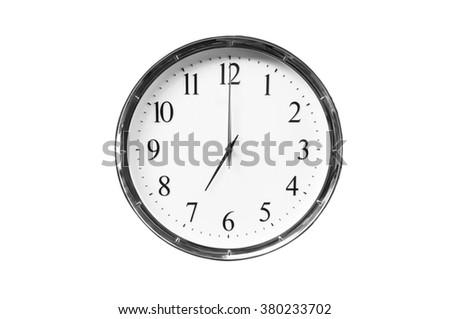 Seven o'clock on the white wall clocks (isolated)
