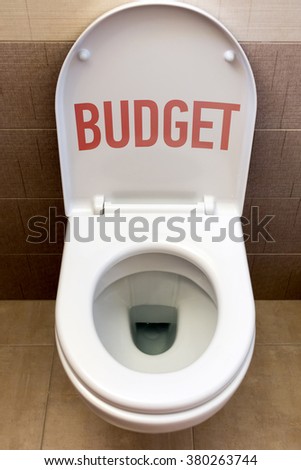 Toilet with an inscription "Budget"