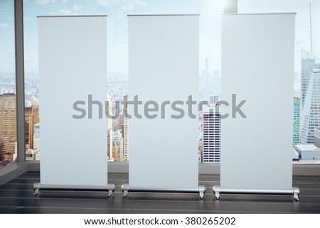 Blank white posters on black wooden floor and glassy walls with megapolis city view, mock up 3D Render