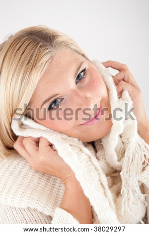 Picture of a young happy pretty winter girl in a sweater