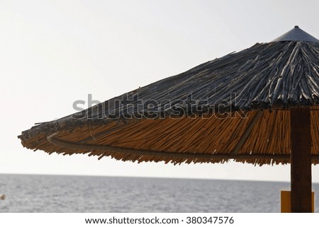 Straw umbrella on the beach
