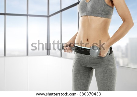 gym club interior and body of woman and free space for you 