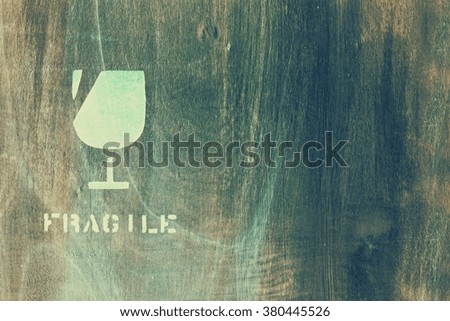 fragile icon on wood board for background used