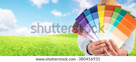 Woman with painting colors.