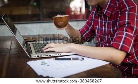 business man working in outdoor using laptop.