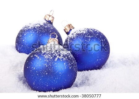 Christmas toy on a snow over white background